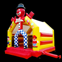 Maison gonflable de clown avec toboggan
